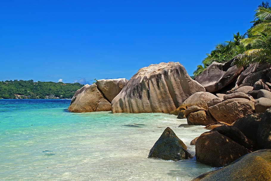 brown rock formation near body of water, sea, shore, beach HD wallpaper