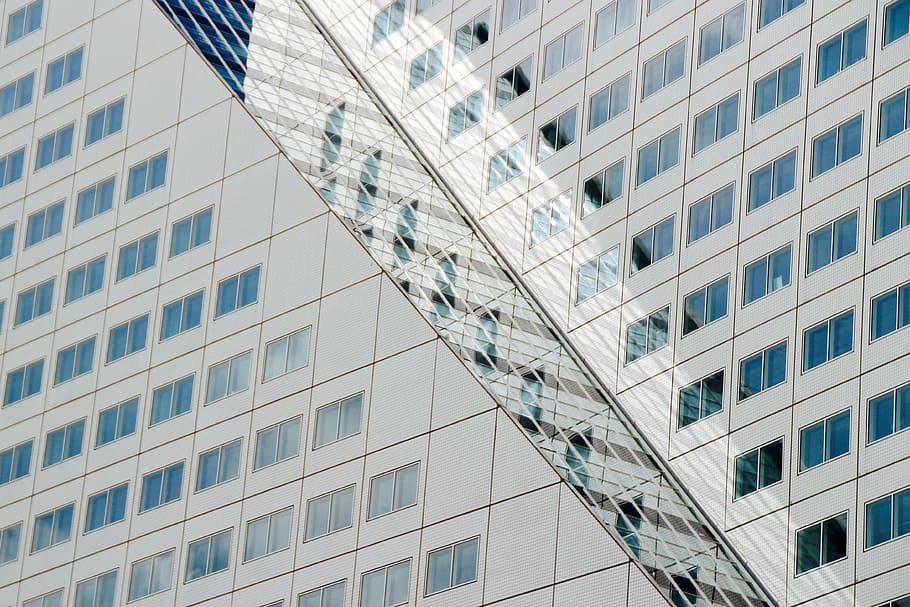 photo of white concrete buildings, side of white high-rise building HD wallpaper