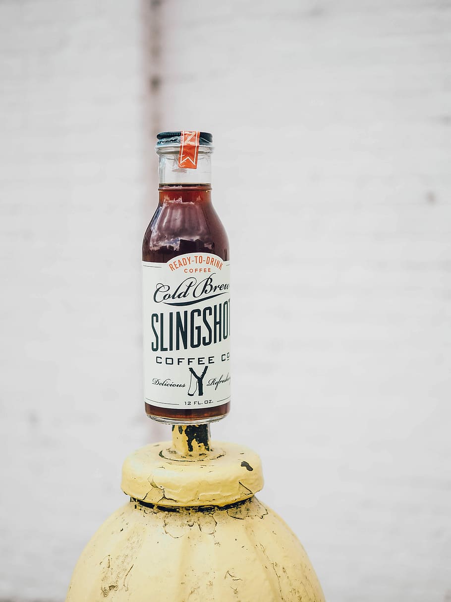 Cold Brew Slingshot bottle, 12 fl oz. Cold Brew Slingshot bottle on yellow metal tube HD wallpaper