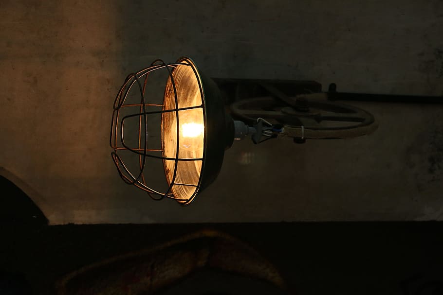 brown sconce with lights on, turned-on black and orange lamp HD wallpaper