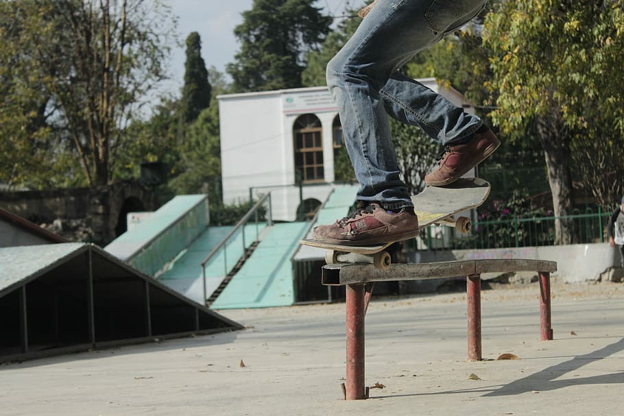 person skating on rail during daytime, person doing skateboard tricks, HD wallpaper