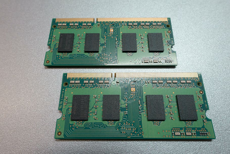 two DDR1 RAM sticks, printed circuit board, memory, green, fund