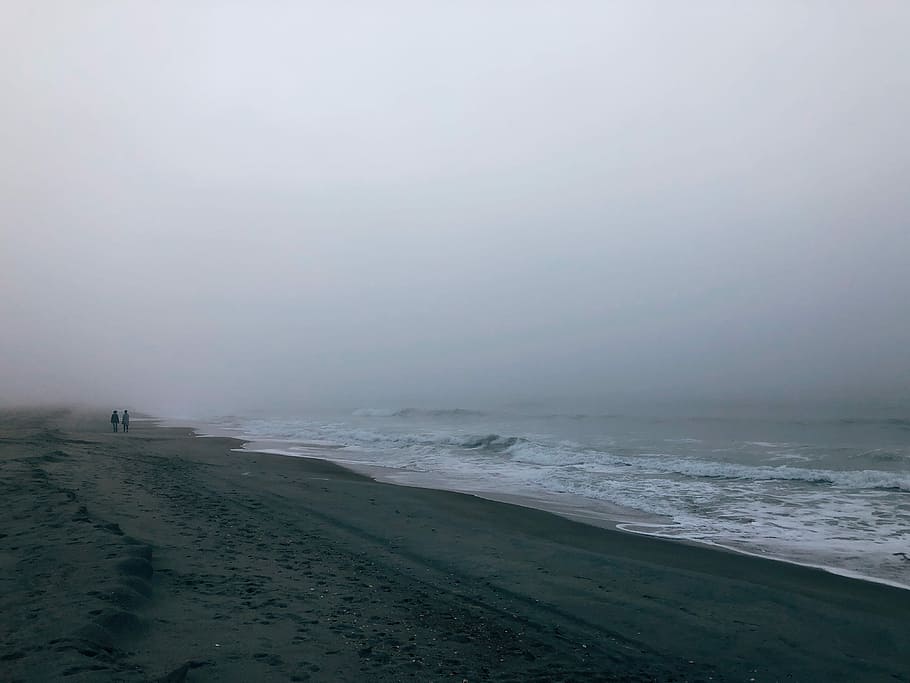 seashore under gray sky, two person walking on seashore, beach HD wallpaper