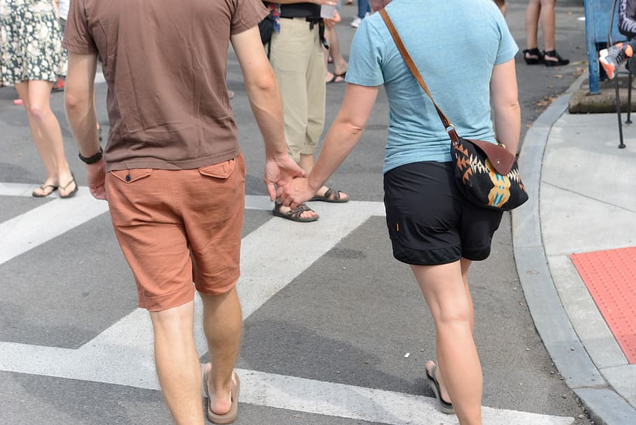 holding hands, couple, walking, city, road, street, day, casual clothing HD wallpaper