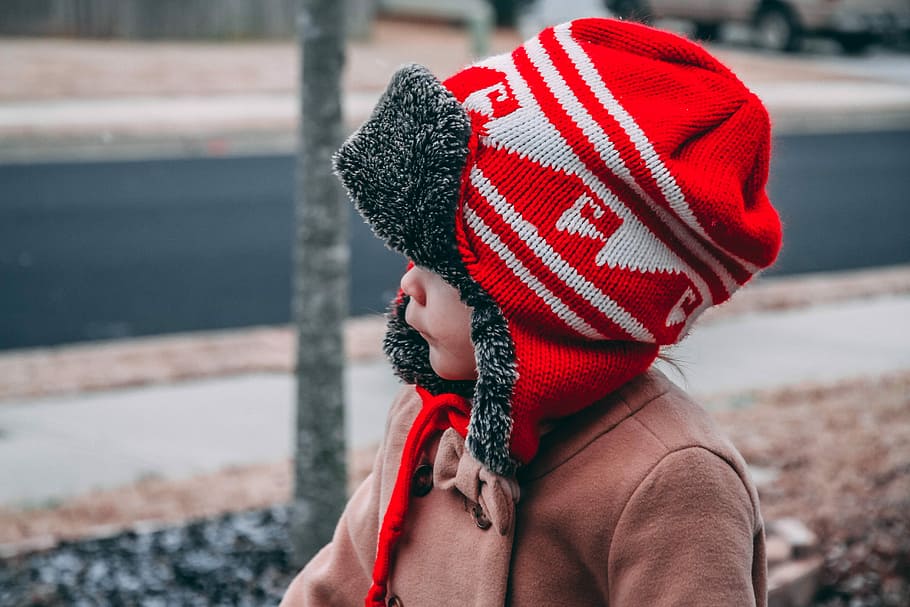 toddler wearing red and white knit hat near road during daytime, untitled HD wallpaper
