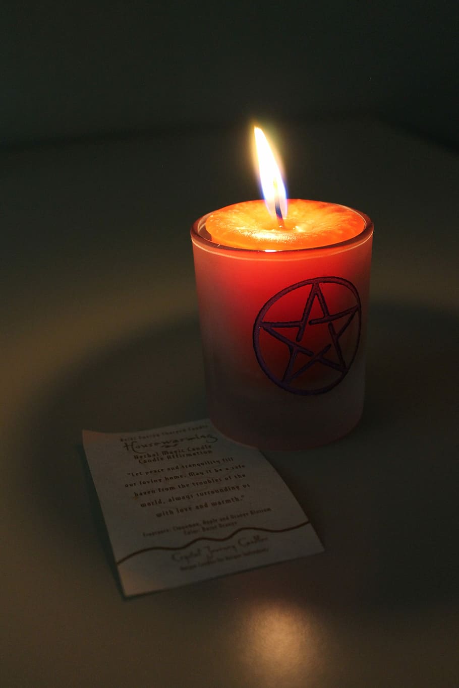 lighted candle with star design, magic, candle magick, flame