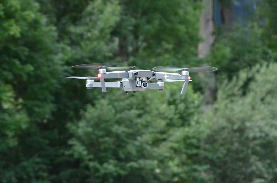 white drone flying in forest, dji, mavic, per, aerial view, float