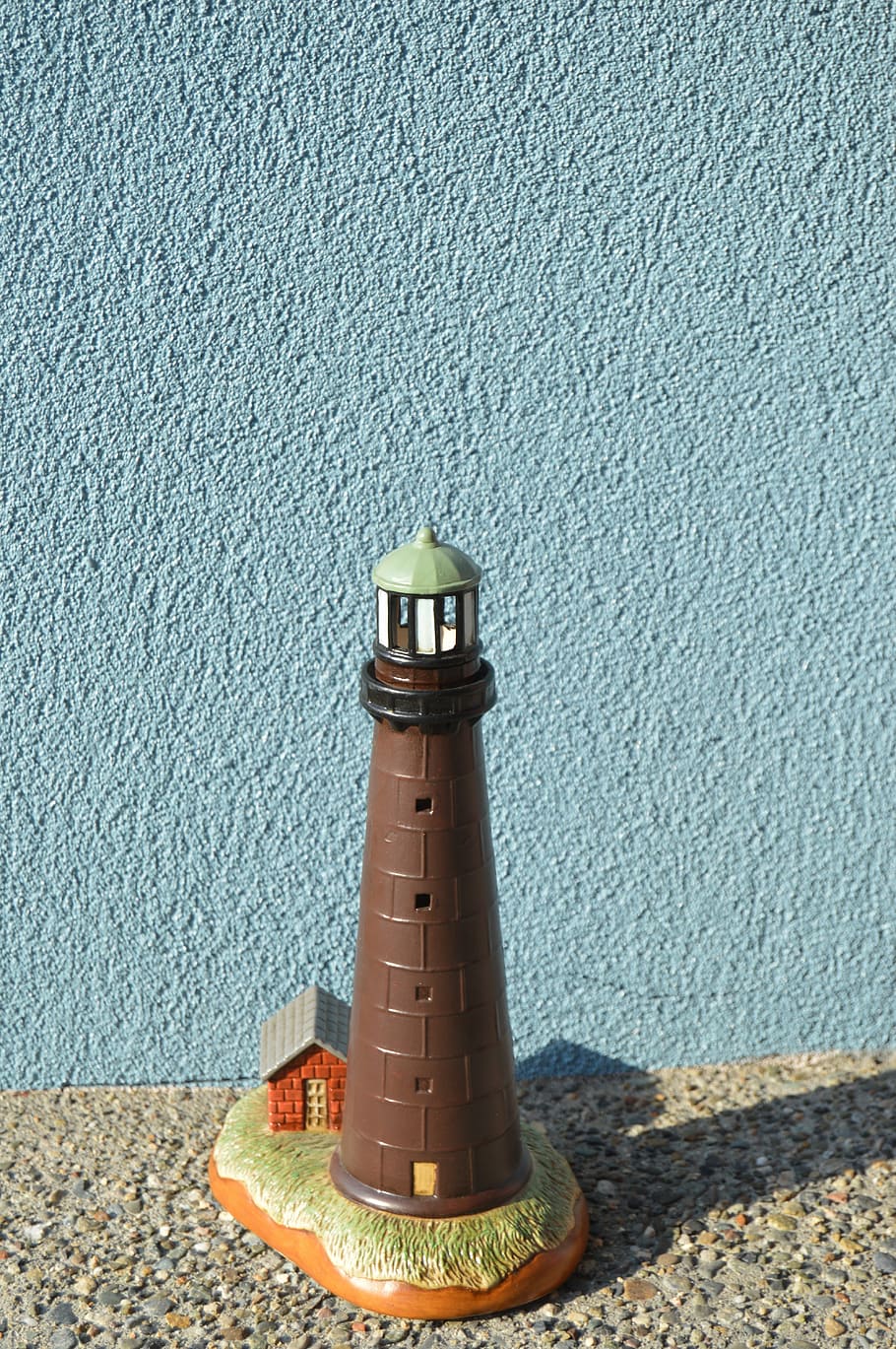brown lighthouse, lighthouse statue, architecture, day, no people HD wallpaper