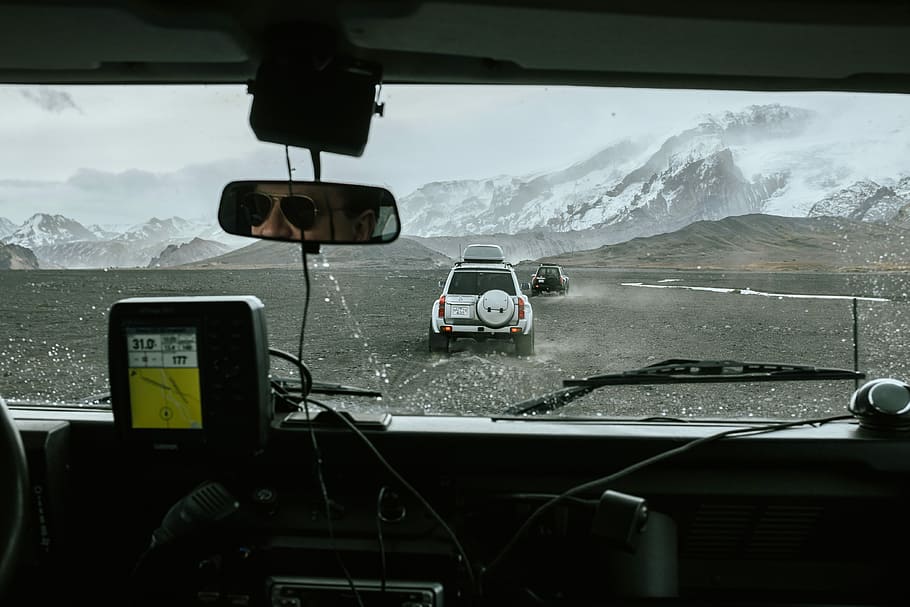 On the way to Þórsmörk, moving white SUV, windscreen, glass HD wallpaper