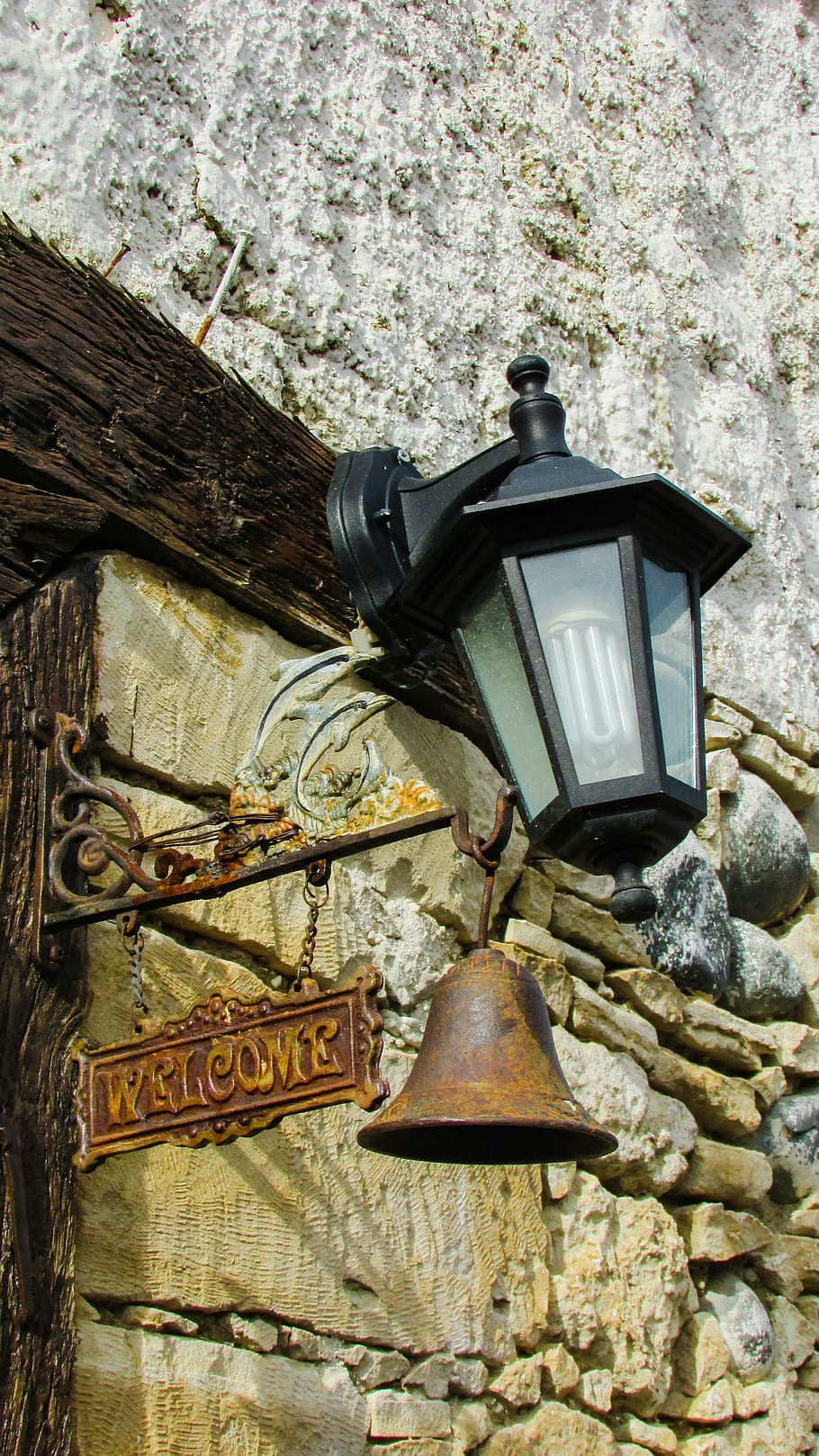 welcome sign, bell, lamp, rustic, tavern, greeting, entrance