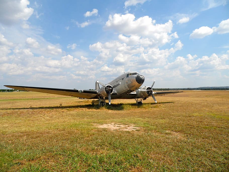 white plane on green field during daytime, dc-3, aircraft, old