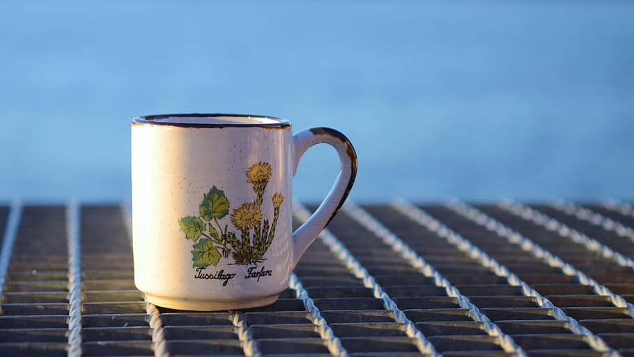 selective focus photography of white and green floral mug, cup HD wallpaper