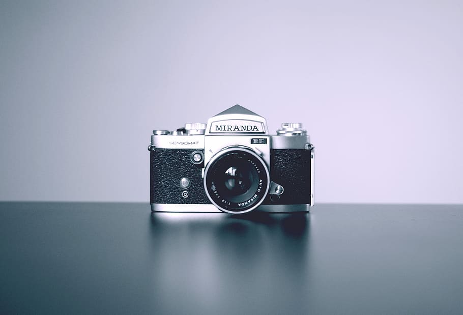 gray and black Miranda DSLR camera, black Miranda SLR camera on black surface HD wallpaper