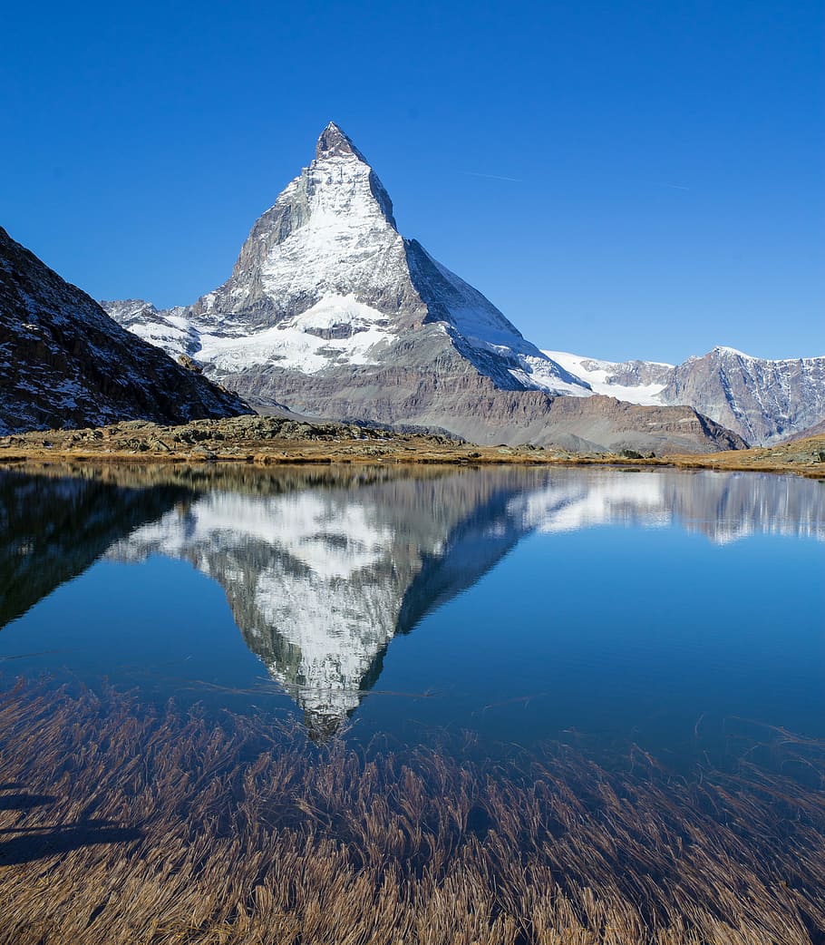 landscape of river and mountain, body of water near gray mountain HD wallpaper