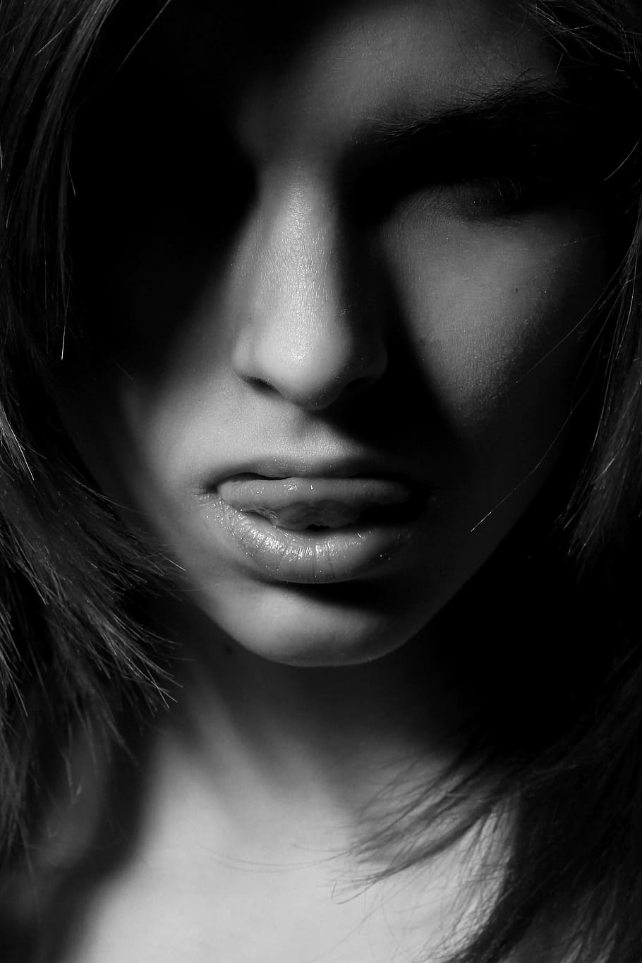 grayscale photo of woman showing her tongue, model, beautiful