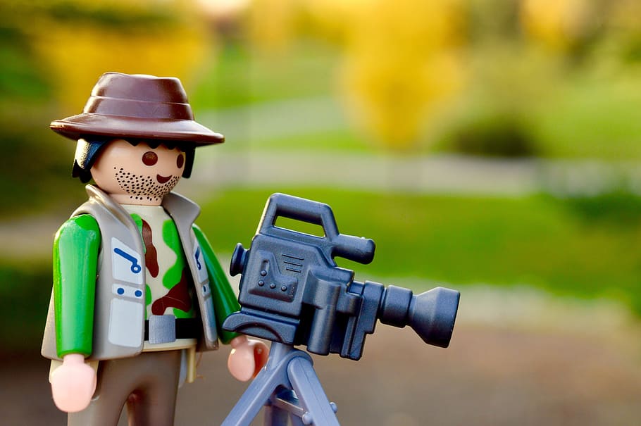 selective focus photography of toy camera man with camera, close up, HD wallpaper