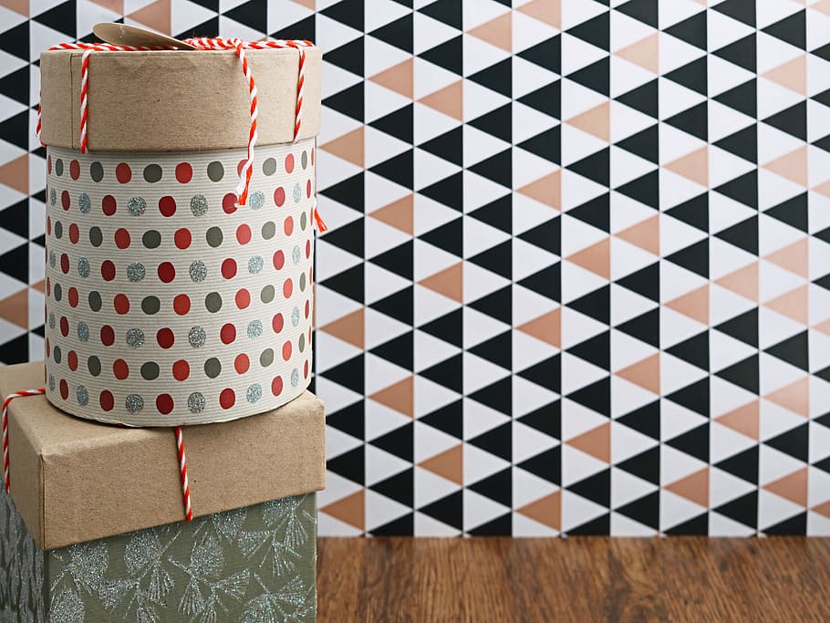 two cardboard boxes, two round and rectangular boxes near wall HD wallpaper