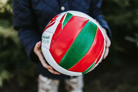 Boy in a blue jacket holding things, man, ball, rubik's cube HD wallpaper