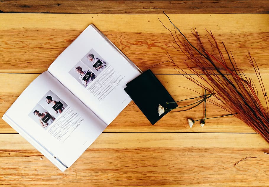 white book page, open, near, black, wallet, table, wood, reading HD wallpaper