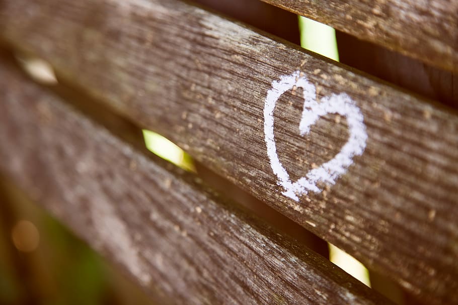 Painted Heart on the Park Bench, white heart illustration on brown wooden board