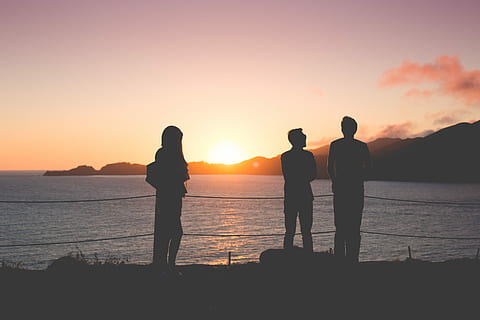 People Enjoying Sunset Over the Ocean, cloudless, coast, group HD wallpaper