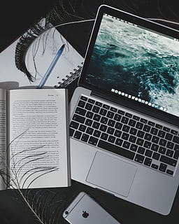 turned on silver MacBook beside open book, laptop, notebook HD wallpaper