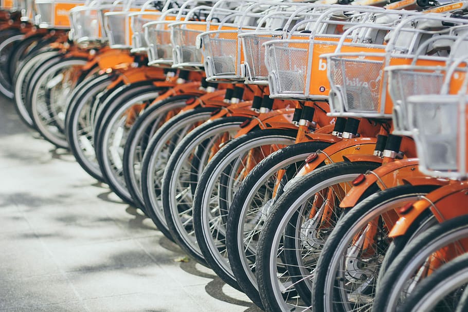 Wheels and Baskets In A Row, orange city bike parking lot, bicycle, HD wallpaper