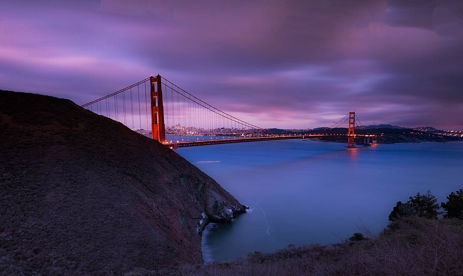 rock, hill, bridge, infrastructure, lights, sea, ocean, water HD wallpaper