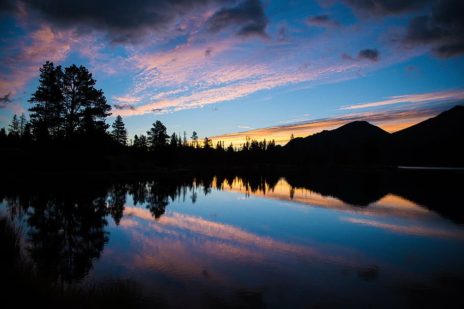 silhouette of trees and mountains during golden hour, sunset HD wallpaper