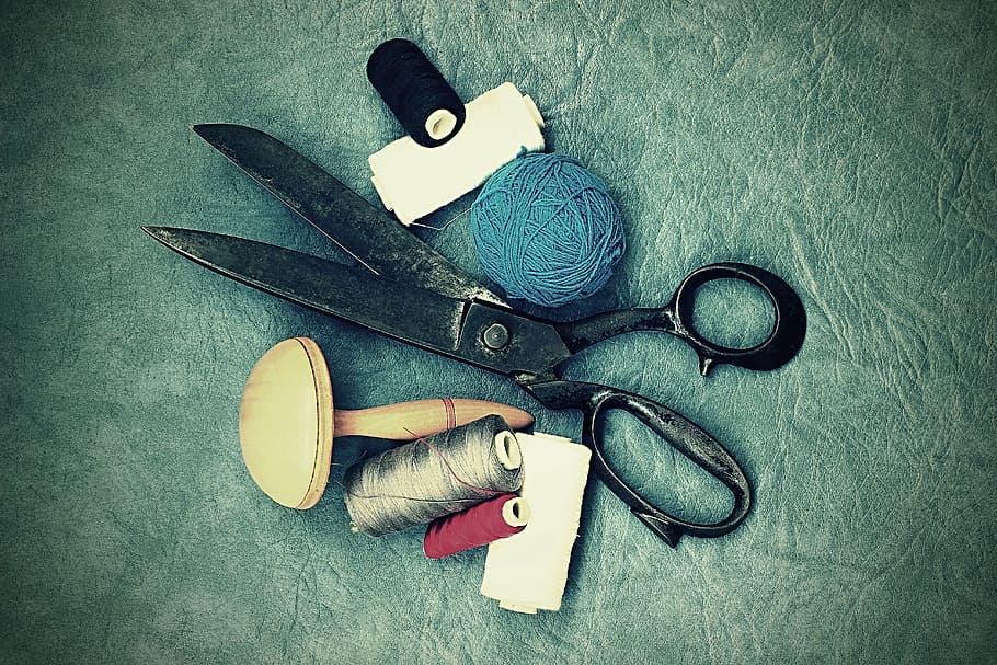 black scissors and threads, old, sewing, on peace, work, dress