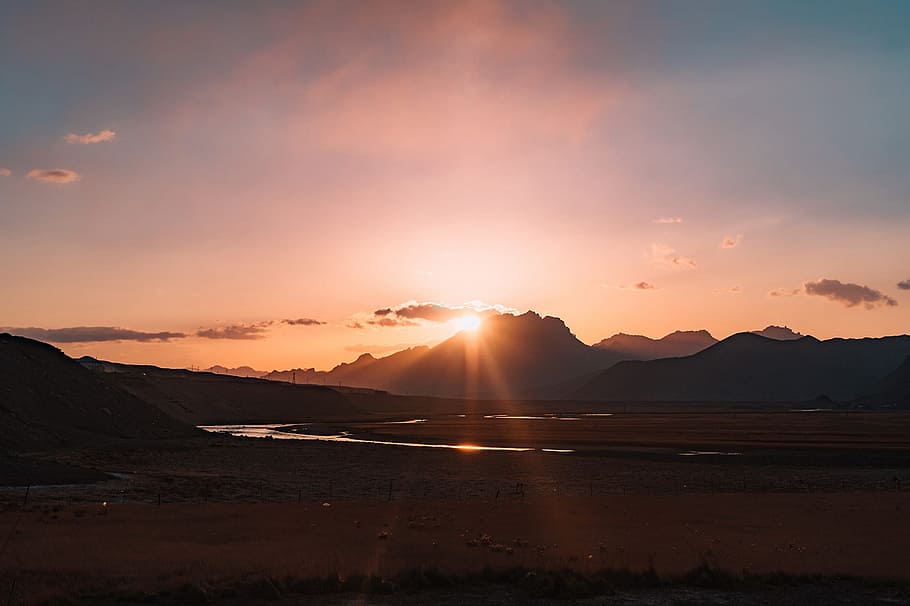 dawn, mountain, sunbeams, sky, water, ocean, scenics - nature HD wallpaper