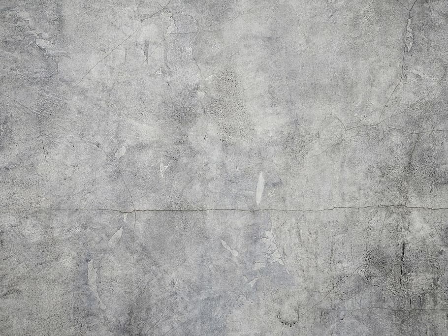 closeup photo of gray concrete wall, cracks, cement, scratches