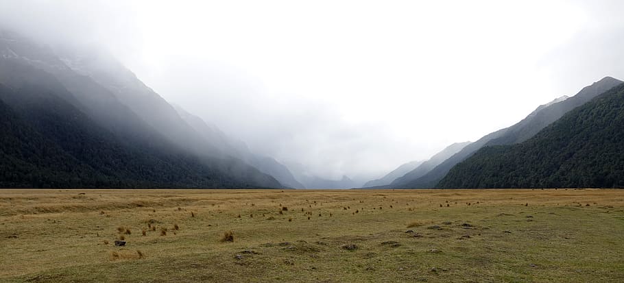 grass field between valley, Nature, Landscape, Sky, Mountain HD wallpaper