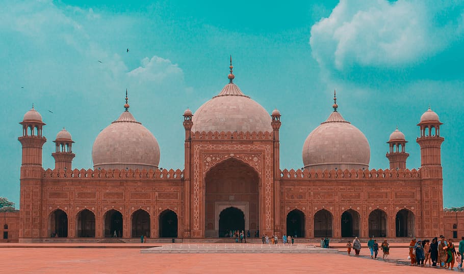 people in front of the dome building, brown concrete dome building with people outside under green sky HD wallpaper