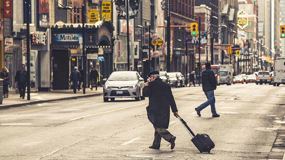 man walking on street, road, highway, people, baggage, car, vehicle, HD wallpaper