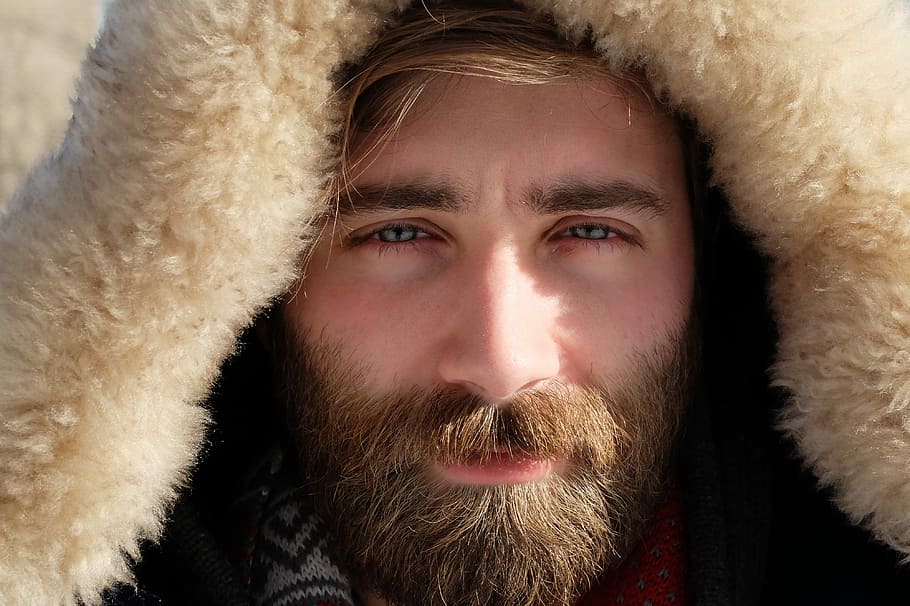 man covered by beige fur textile, person taking selfie photo HD wallpaper