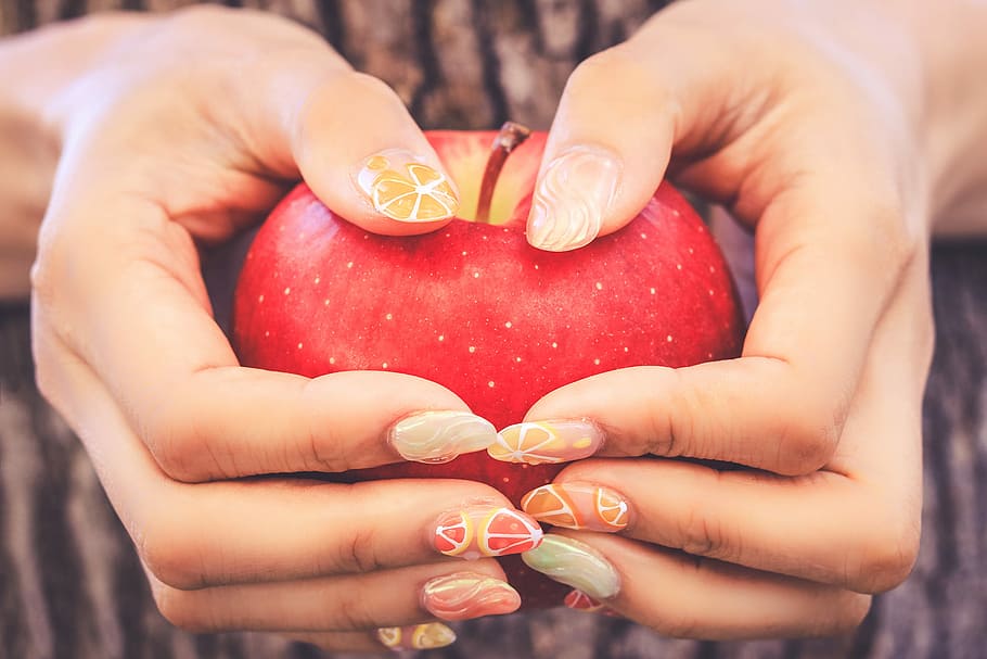 person holding apple with nail polish, human Hand, love, heart Shape HD wallpaper