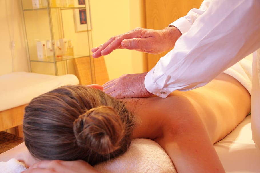 woman in prone position having a back massage, wellness, lying down, HD wallpaper