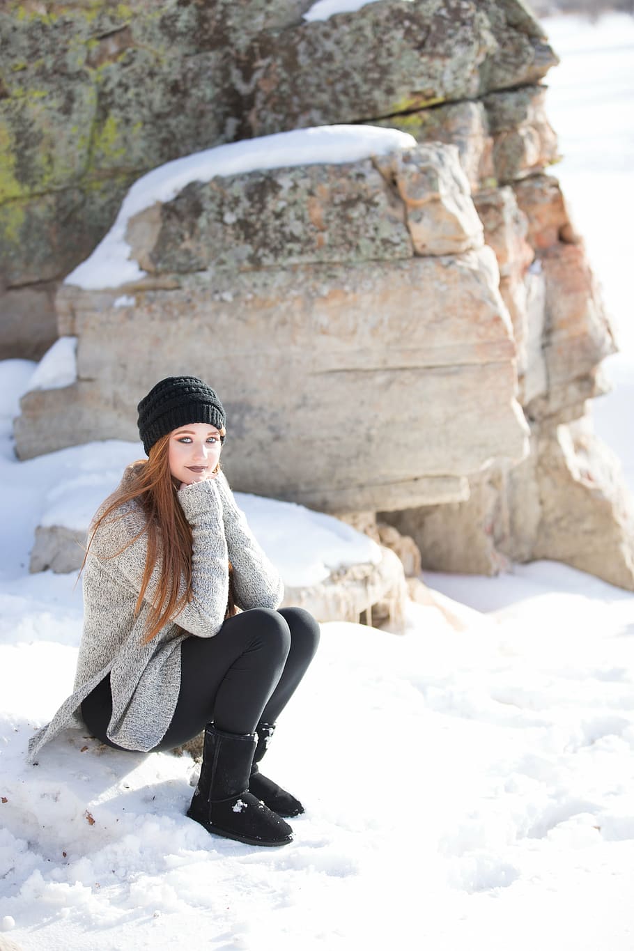 woman in black pants sitting on chair, winter, rocks, redhead HD wallpaper