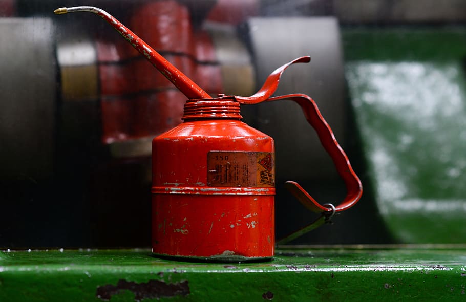 red oil can on green surface, product, container, grease, metal HD wallpaper