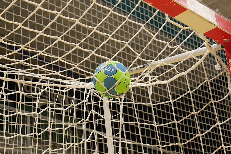 blue and green soccer ball on white net, handball, training, goal