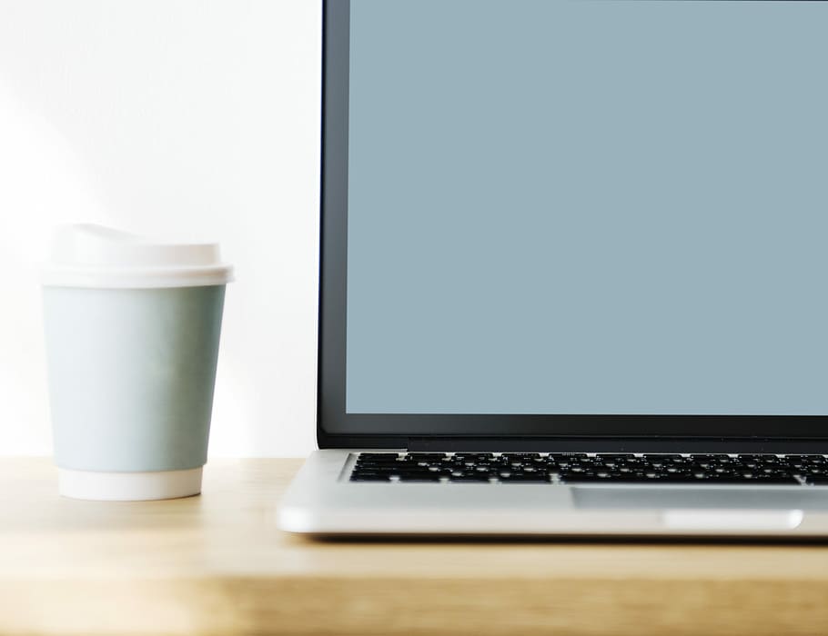 gray laptop computer beside gray and white plastic cup, coffee HD wallpaper