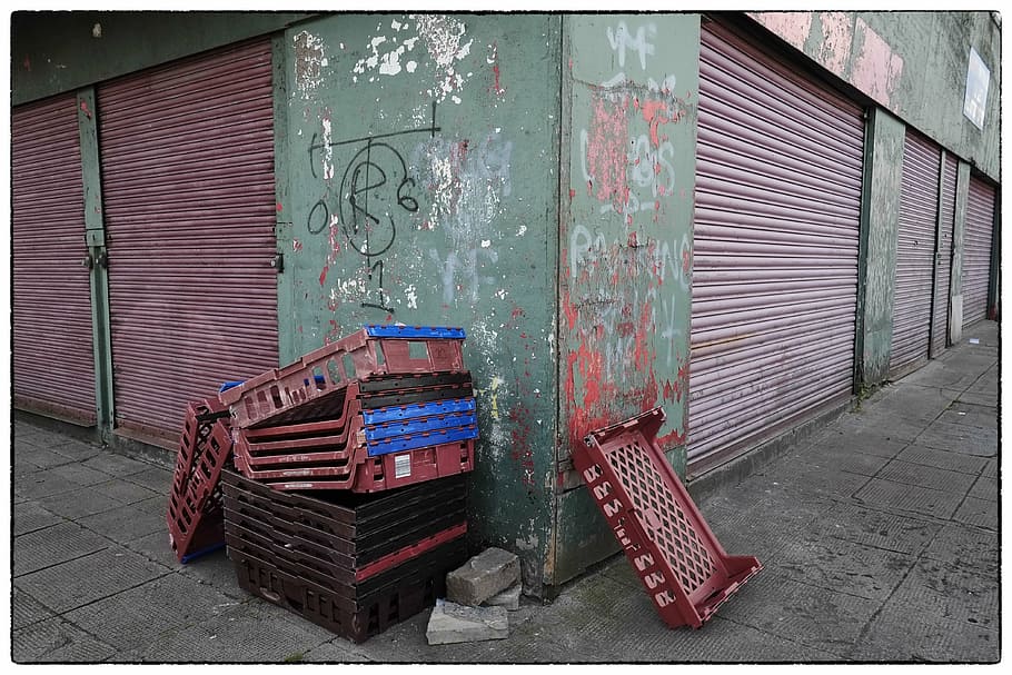 red, blue, and brown plastic trays, rubbish, urban, street, trash