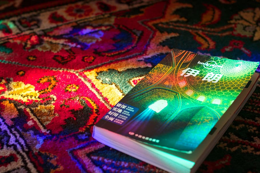 green titled book on cloth, kanji, text, printed, carpet, art HD wallpaper