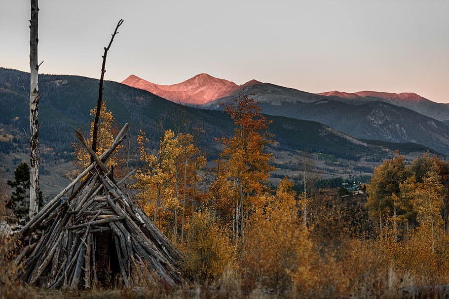brown teepee tent during dawn, mountain, highland, cloud, sky HD wallpaper