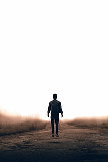 man standing on brown concrete road, nature, grass, field, sunlight HD wallpaper