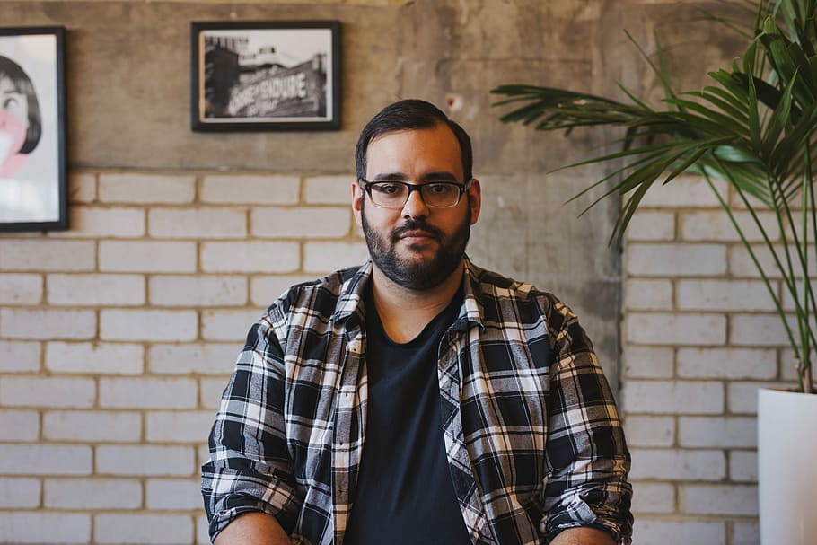man self portrait wearing gray and white collared button-up shirt near green leaf plant with white ceramic pot, man wearing eyeglasses HD wallpaper