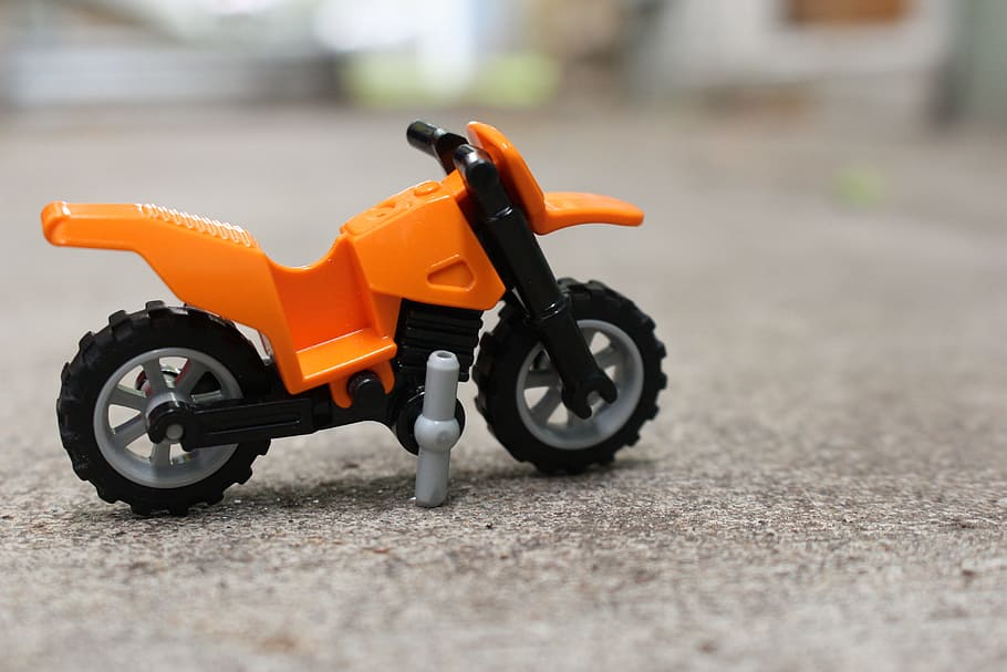 Macro, Lego, Toy, Plastic, Depth, Blur, orange color, motorcycle HD wallpaper