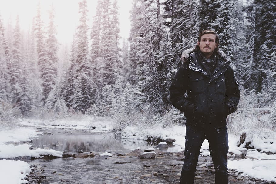 man in black jacket on swamp, man standing on river, male, winter HD wallpaper
