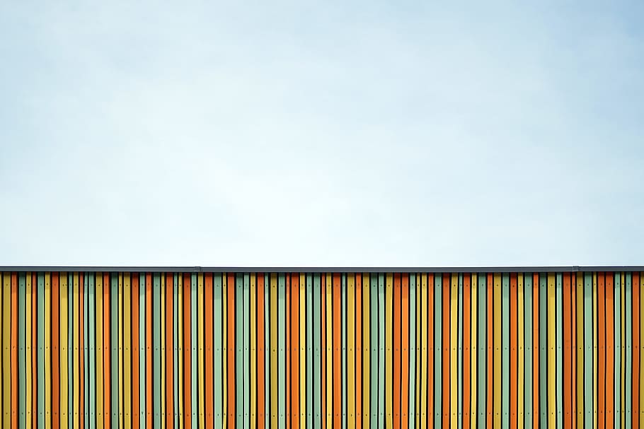 orange, teal, and yellow wooden fence at daytime, backgrounds HD wallpaper